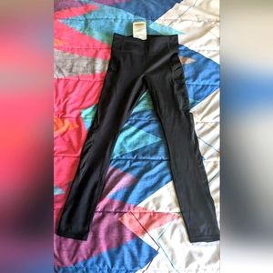 NWT Black Fabletics tights with pockets and sheer side panels